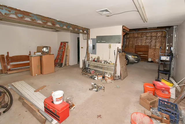 a view of a livingroom with furniture and toys