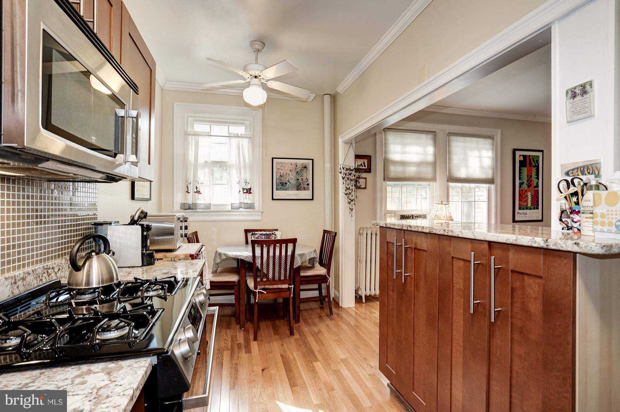 2707 Adams Mill Road Northwest, Unit 107 Washington, DC 20009 - Photo 9 of 20 View from Kitchen into Dining Nook