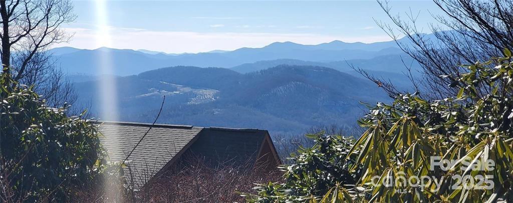 Tbd Henredon Road Spruce Pine, NC 28777 - Photo 7 of 10 a view of a houses with a yard
