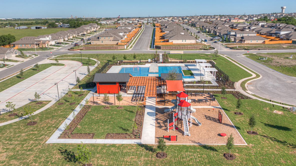 568 Globe Mallow Circle Kyle, TX 78640 - Photo 18 of 21 an aerial view of a pool with a yard and lake view