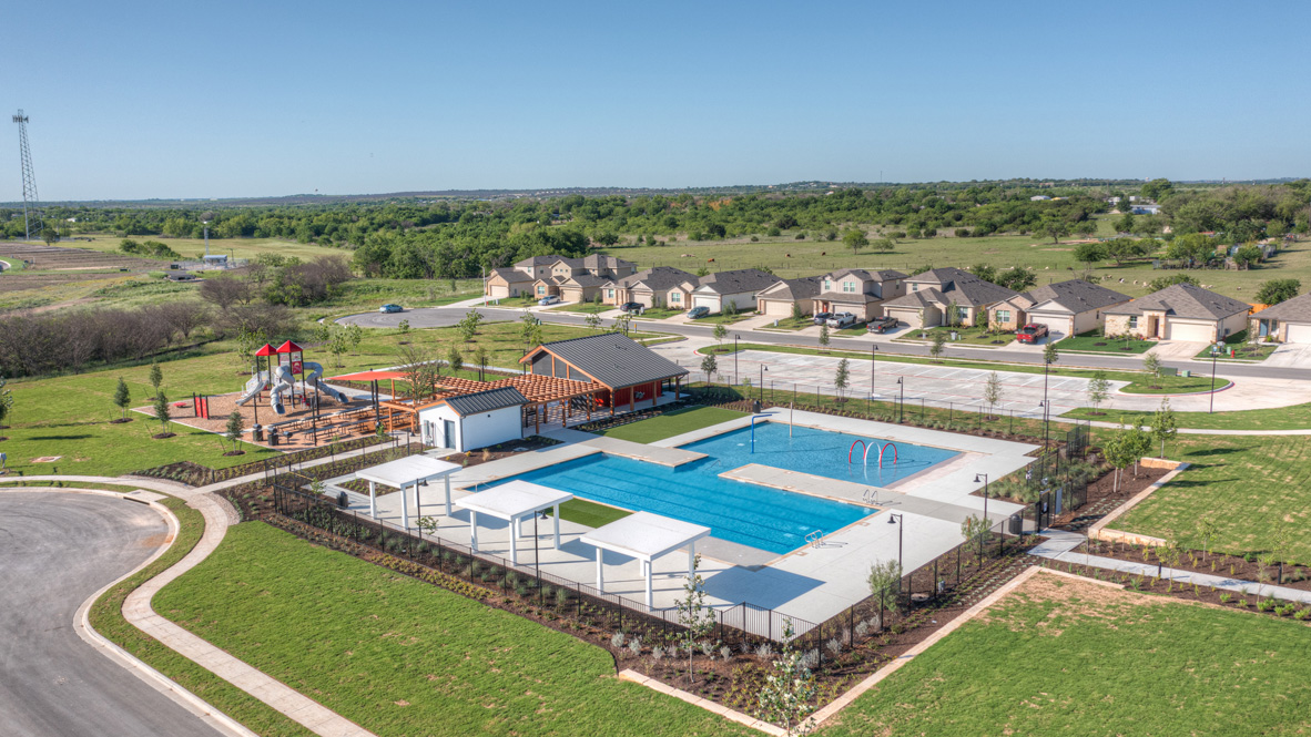 568 Globe Mallow Circle Kyle, TX 78640 - Photo 19 of 21 an aerial view of a house with a swimming pool