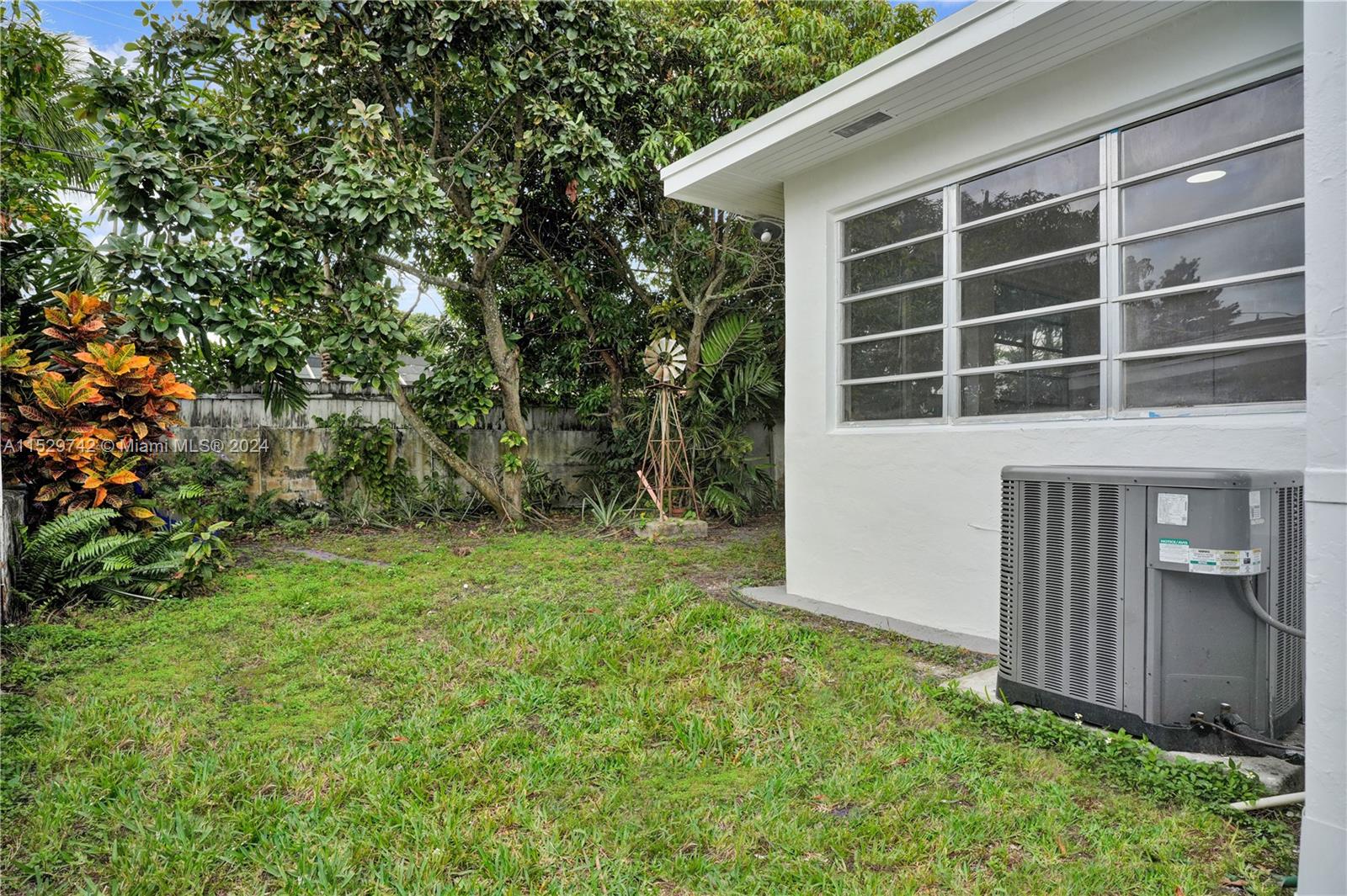 1886 Southwest 16th Terrace Miami, FL 33145 - Photo 13 of 14 a view of a house with backyard