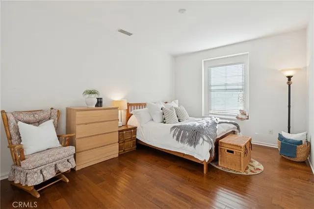 a bathroom with double sink and a mirror