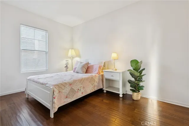 a room with a bed and a chair