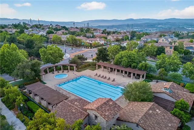 a view of a park with swings and slides