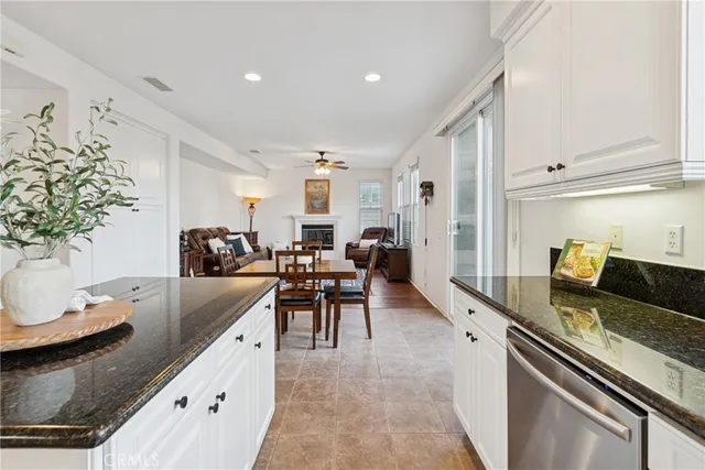 a large kitchen with granite countertop lots of counter top space