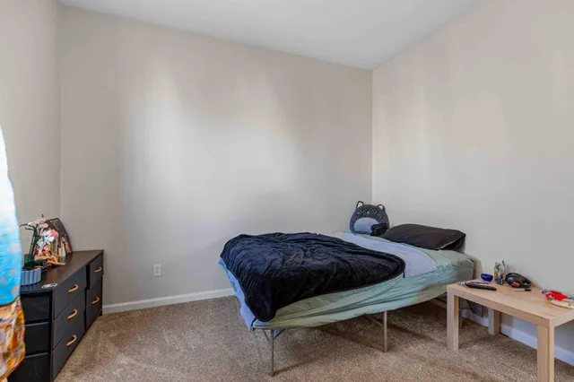 a room with furniture and a window