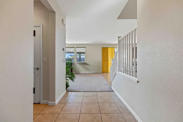 a view of an entryway with livingroom