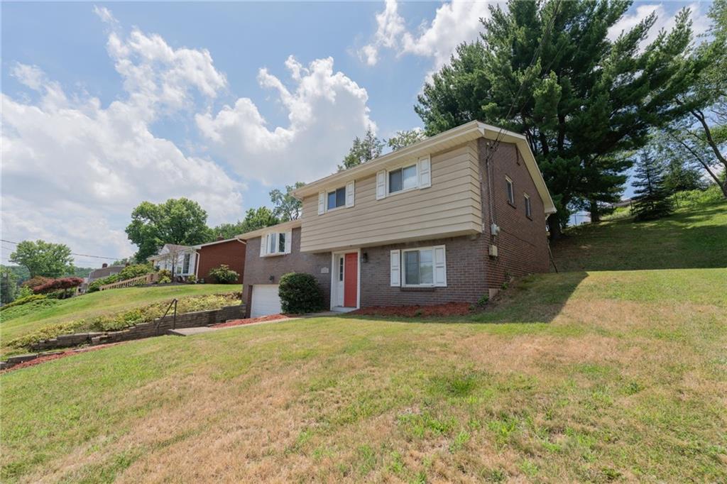 200 Foxcroft Road Pittsburgh, PA 15220 - Photo 2 of 43 a front view of house with yard and green space