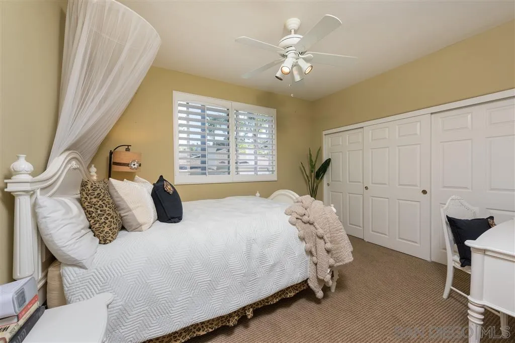 11692 Eastfield Road Poway, CA 92064 - Photo 17 of 25 a bedroom with a bed and window