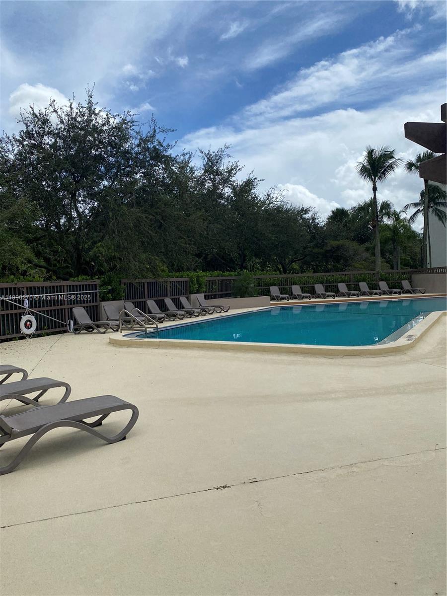 9725 Northwest 52nd Street, Unit 522 Doral, FL 33178 - Photo 13 of 17 a view of a yard