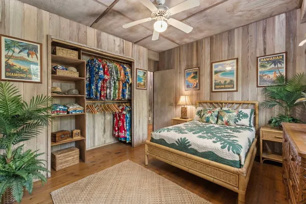 a bedroom with furniture and a bed