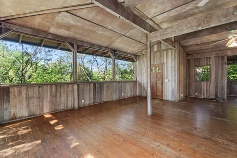 a bathroom with a sink toilet and a mirror