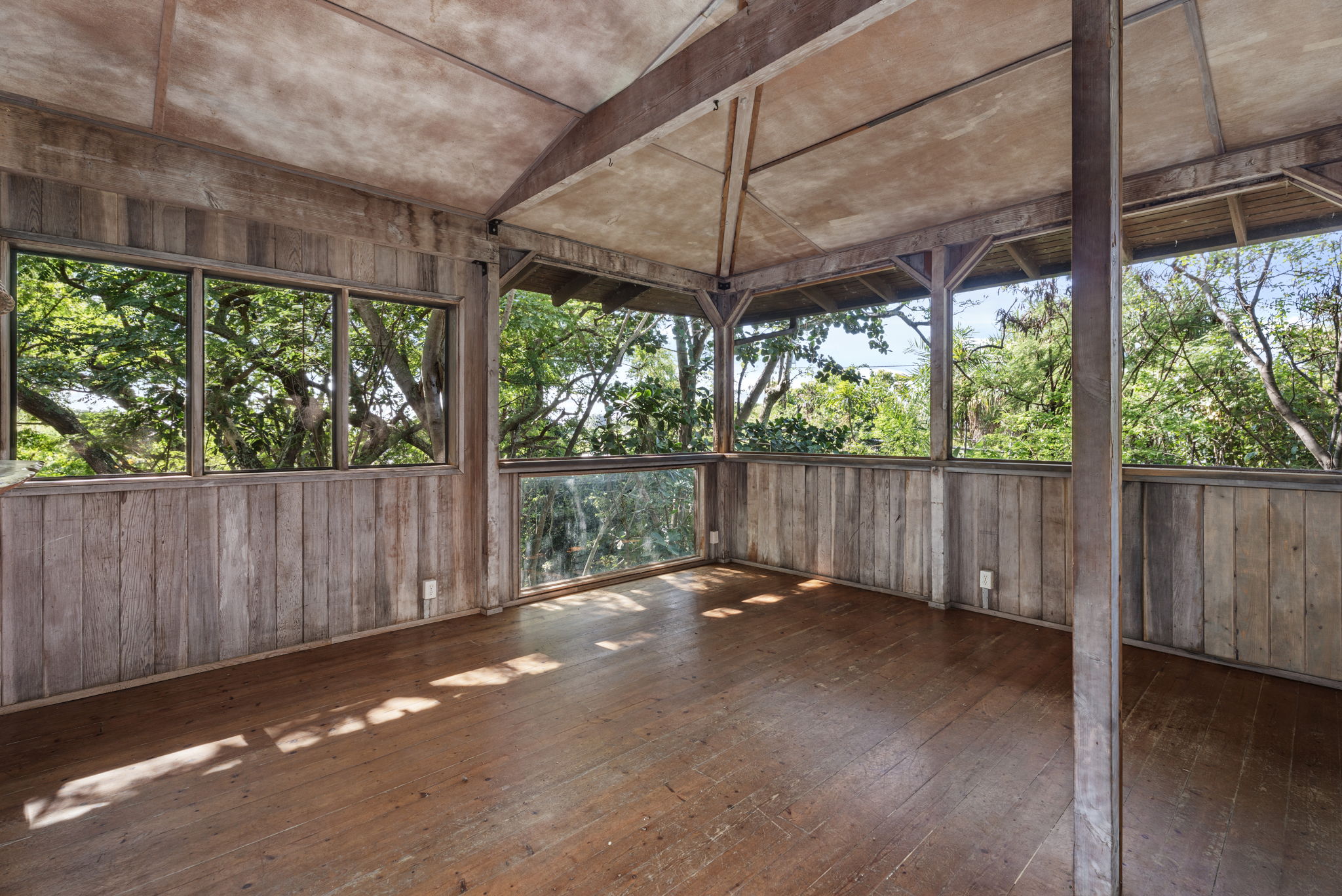 82-6284 Puuhonua Road Captain Cook, HI 96704 - Photo 2 of 30 a view of a backyard with wooden floor
