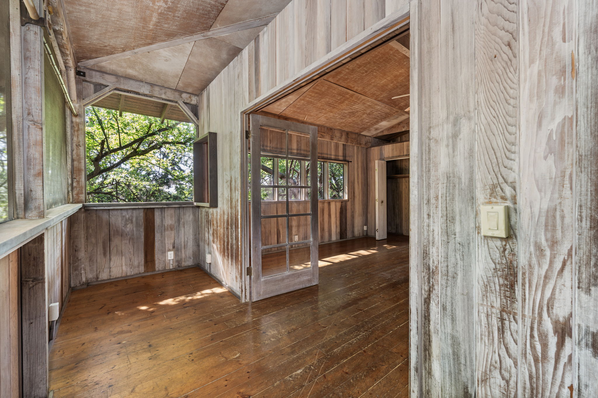 82-6284 Puuhonua Road Captain Cook, HI 96704 - Photo 23 of 30 a view of a porch with a backyard