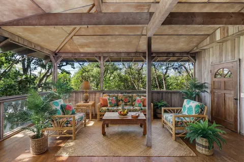 a outdoor living space with furniture and garden view