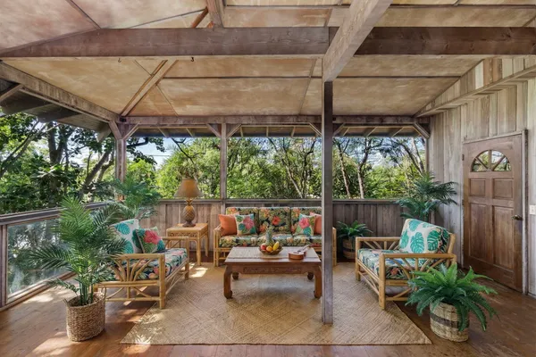 a outdoor living space with furniture and garden view