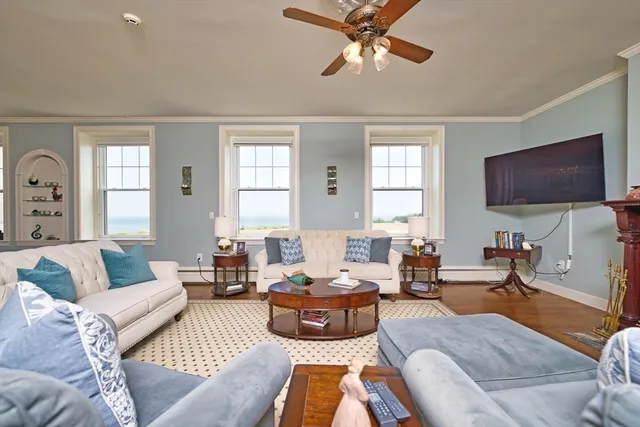 a bedroom with a bed and a fireplace