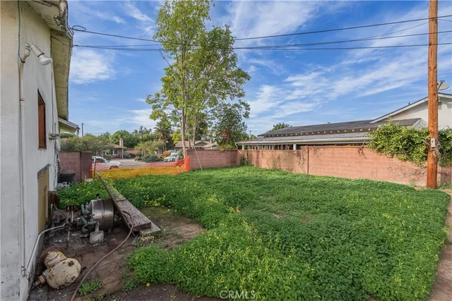a view of a garden with a lake