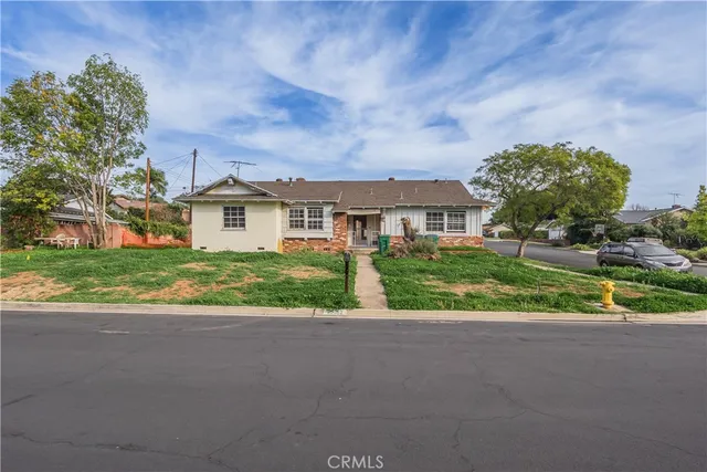 a view of house with outdoor space and street view