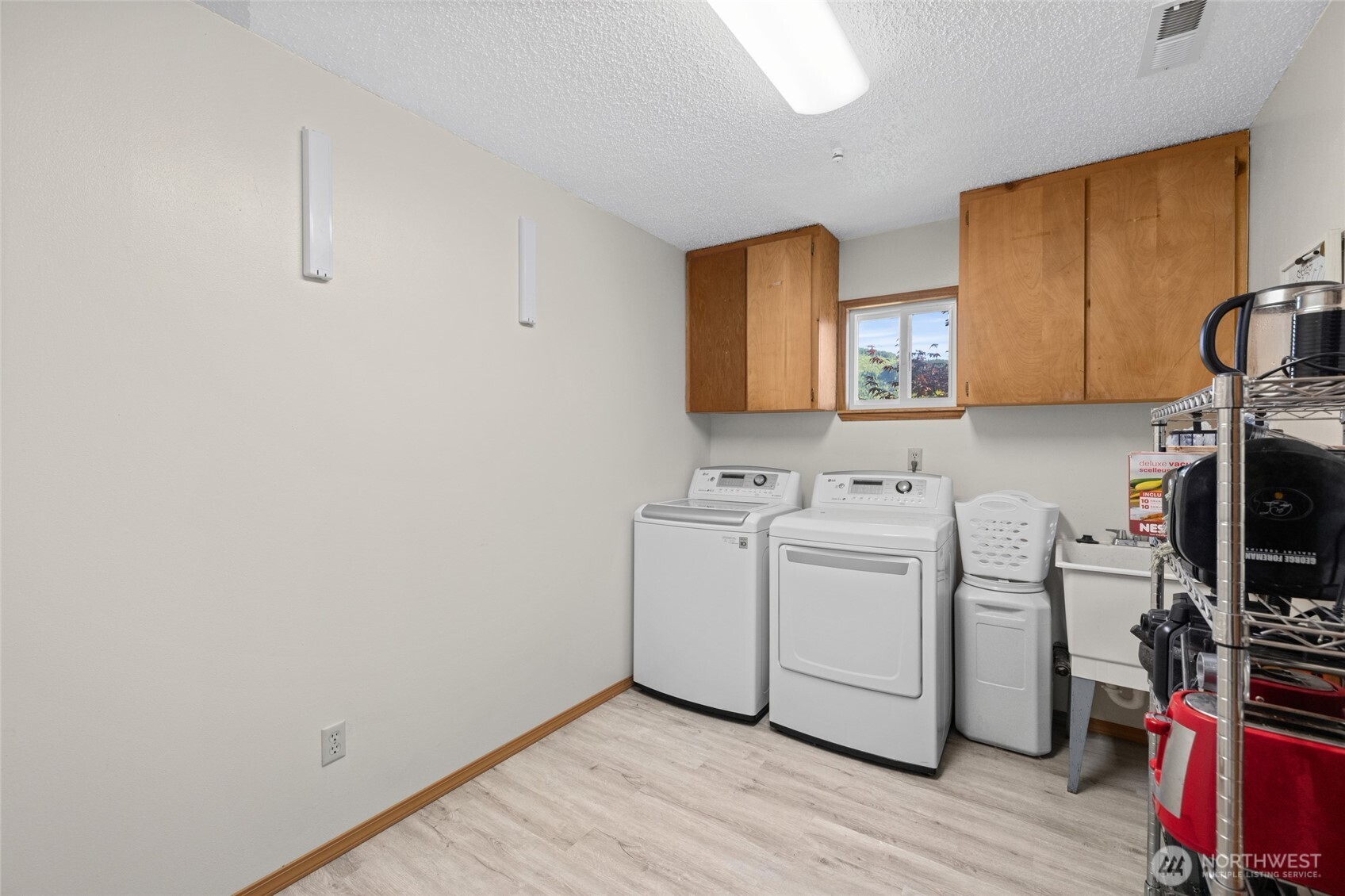 415 Sterling Street Sedro-Woolley, WA 98284 - Photo 22 of 38 a view of a room with storage and utility