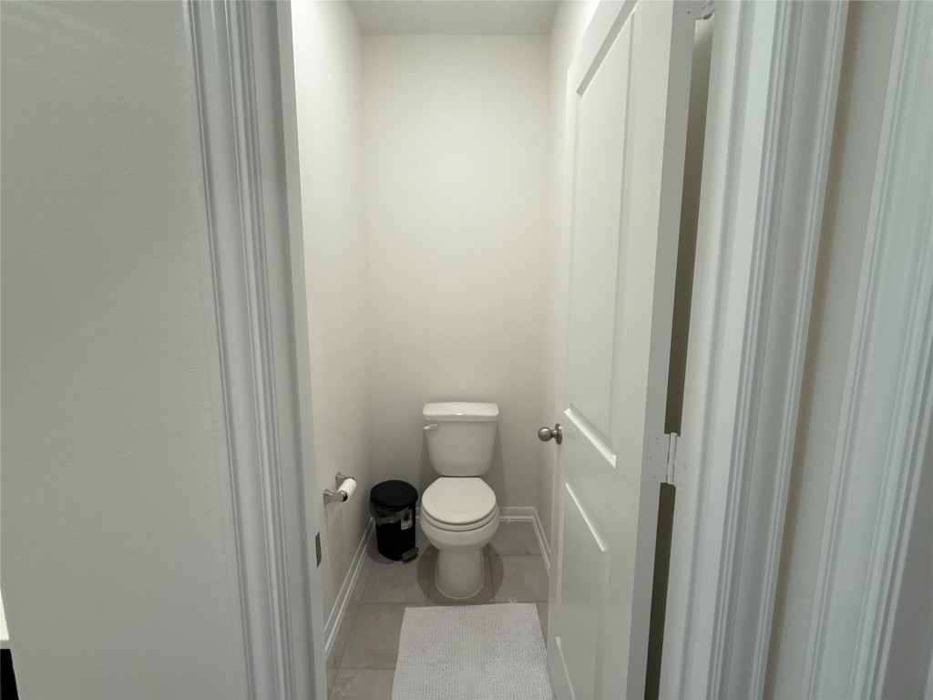 527 Baobab Way Crosby, TX 77532 - Photo 23 of 50 a bathroom with a toilet and a sink