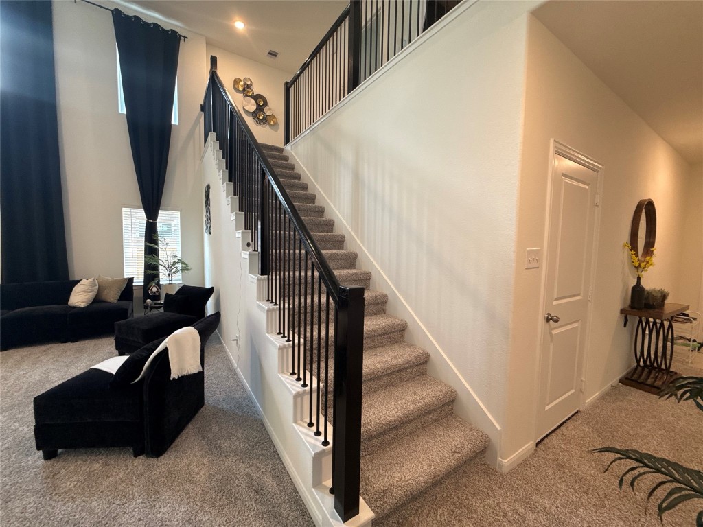527 Baobab Way Crosby, TX 77532 - Photo 25 of 50 a view of staircase with lots of frames and frames on wall