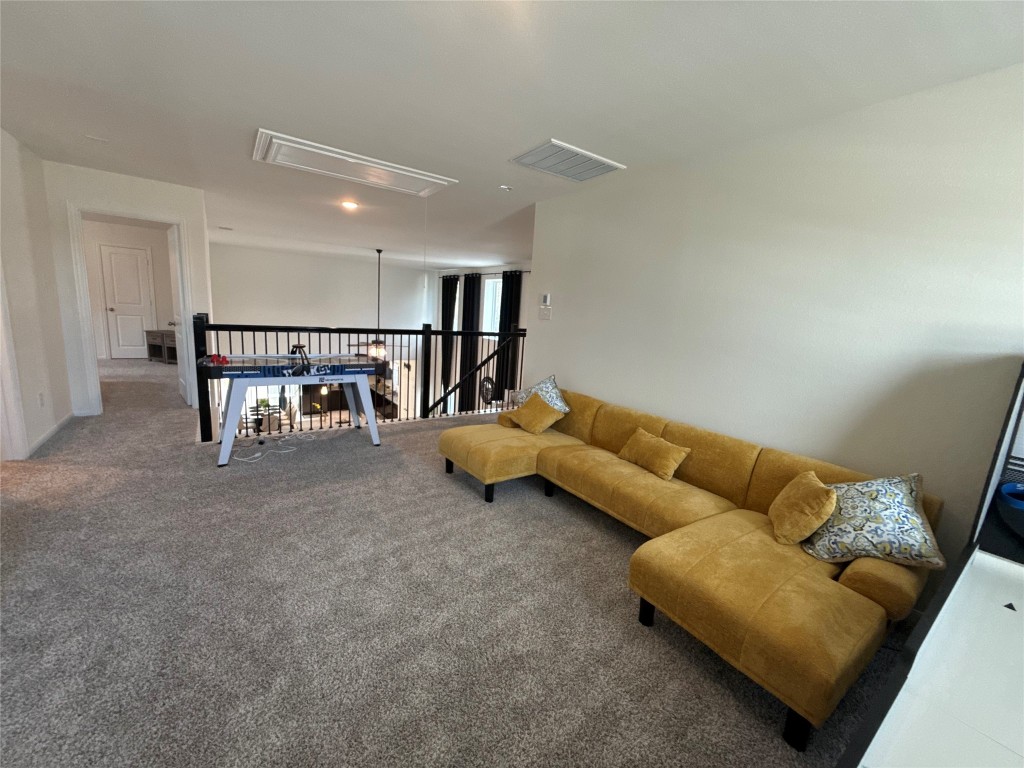 527 Baobab Way Crosby, TX 77532 - Photo 28 of 50 a living room with furniture and a couch