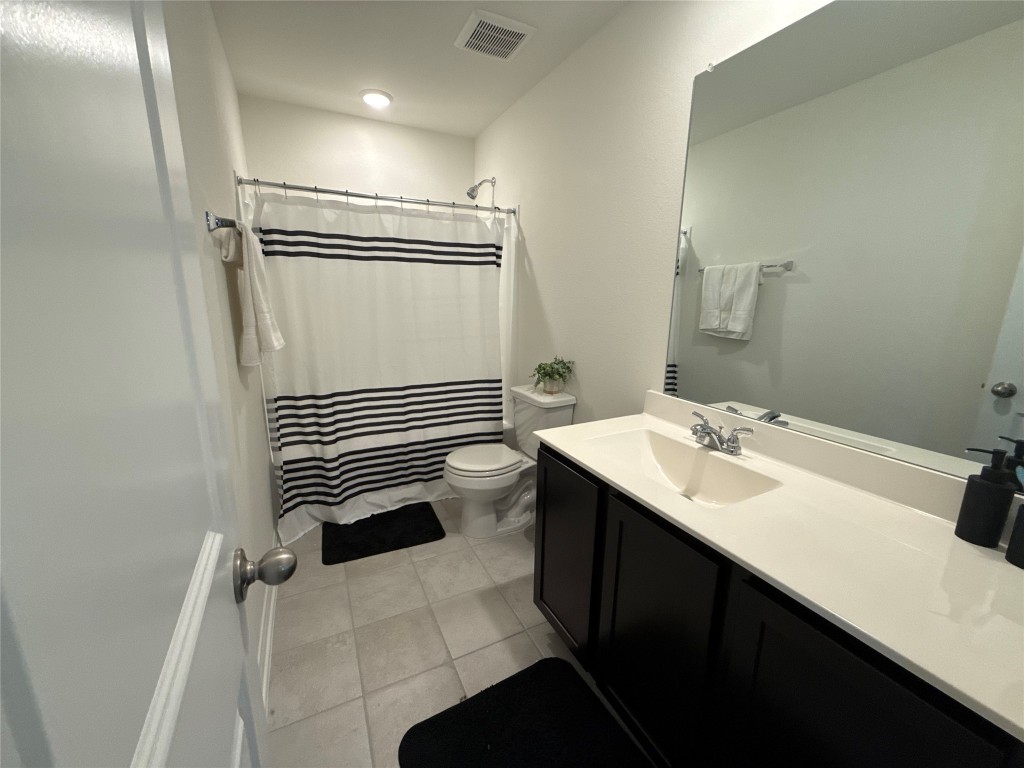 527 Baobab Way Crosby, TX 77532 - Photo 35 of 50 a bathroom with a sink a toilet and shower