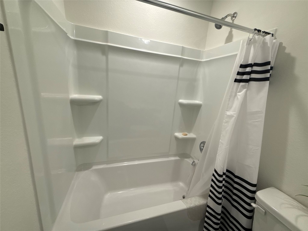 527 Baobab Way Crosby, TX 77532 - Photo 40 of 50 a bathroom with a shower and a toilet