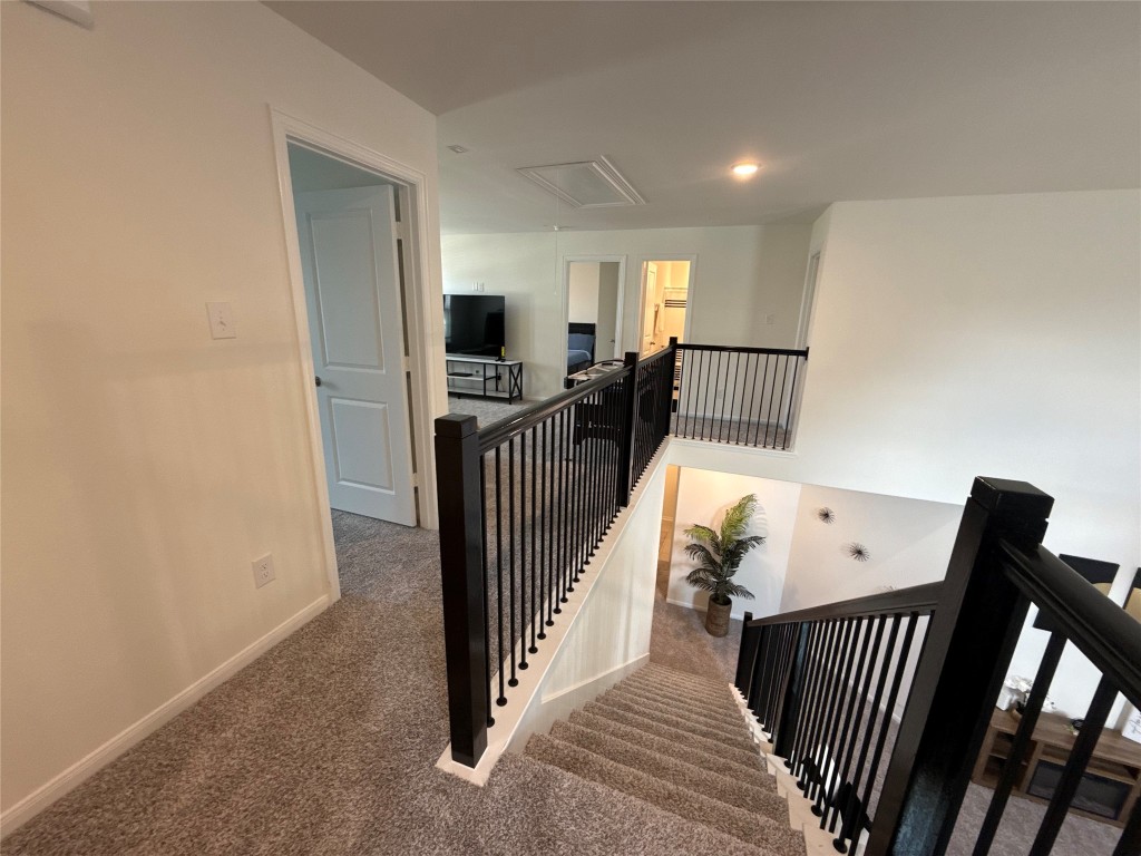 527 Baobab Way Crosby, TX 77532 - Photo 45 of 50 a view of a hallway with workspace