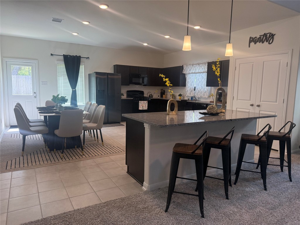 527 Baobab Way Crosby, TX 77532 - Photo 6 of 50 a view of a dining room with furniture