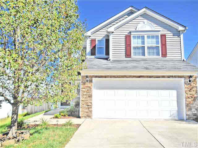 5012 Mocha Lane Raleigh, NC 27616 - Photo 1 of 14 a front view of a house with a yard