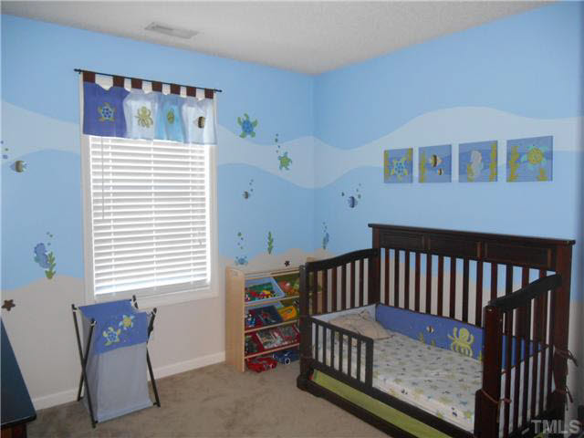 5012 Mocha Lane Raleigh, NC 27616 - Photo 14 of 14 a view of a bedroom with furniture and windows