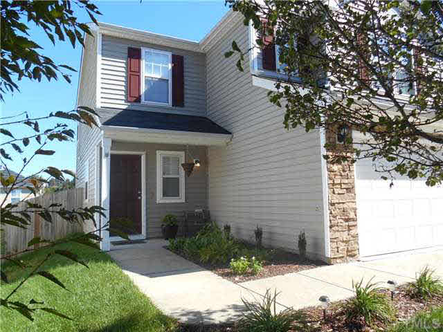 5012 Mocha Lane Raleigh, NC 27616 - Photo 2 of 14 a front view of a house with a yard