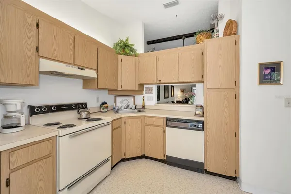 a bedroom with a bed and a chair