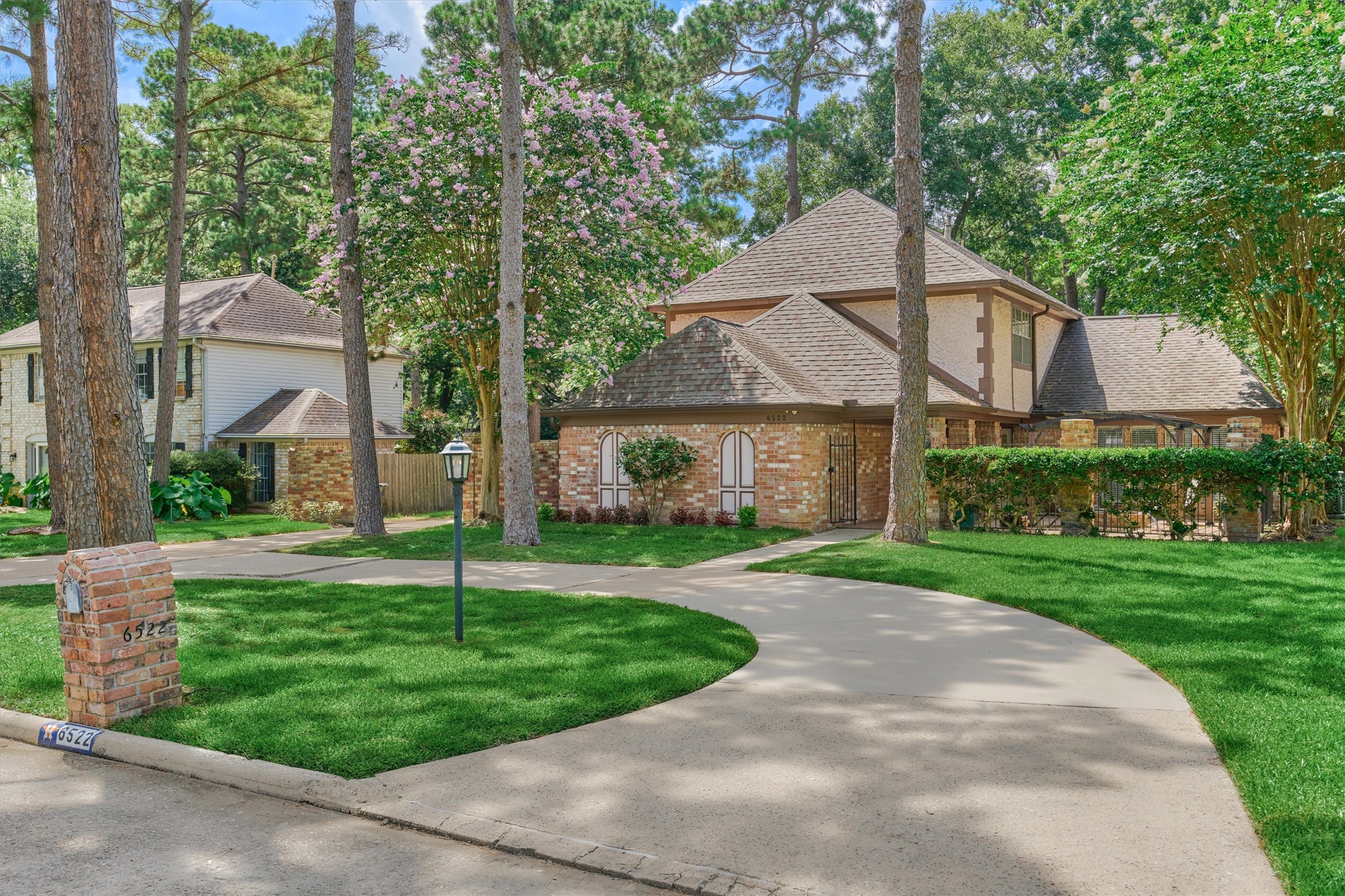 6522 Castle Pine Lane Spring, TX 77379 - Photo 2 of 49 a front view of a house with a yard and garage