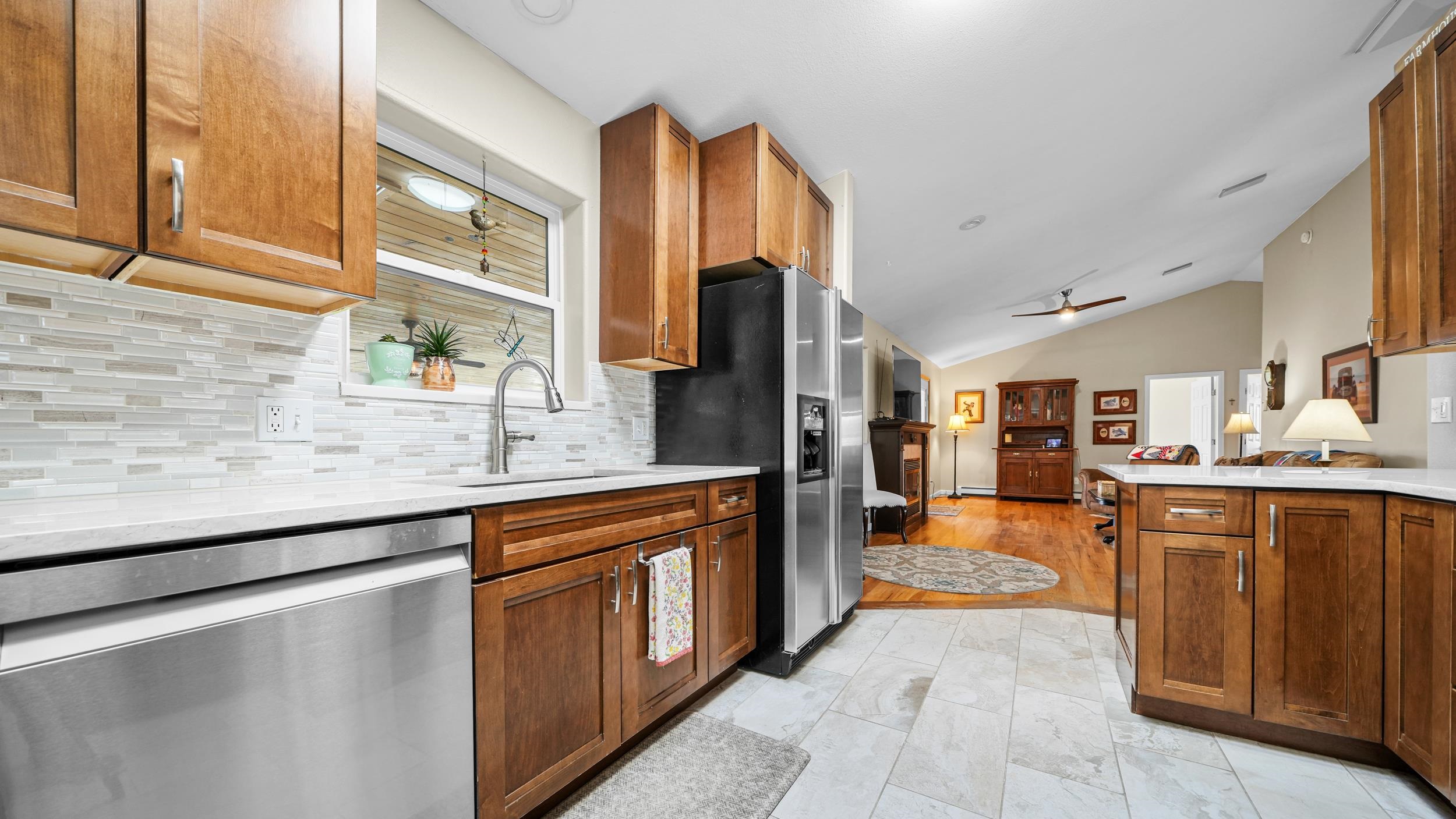 1392 M M 1/4 Road Loma, CO 81524 - Photo 14 of 42 a large kitchen with stainless steel appliances granite countertop a refrigerator and a sink