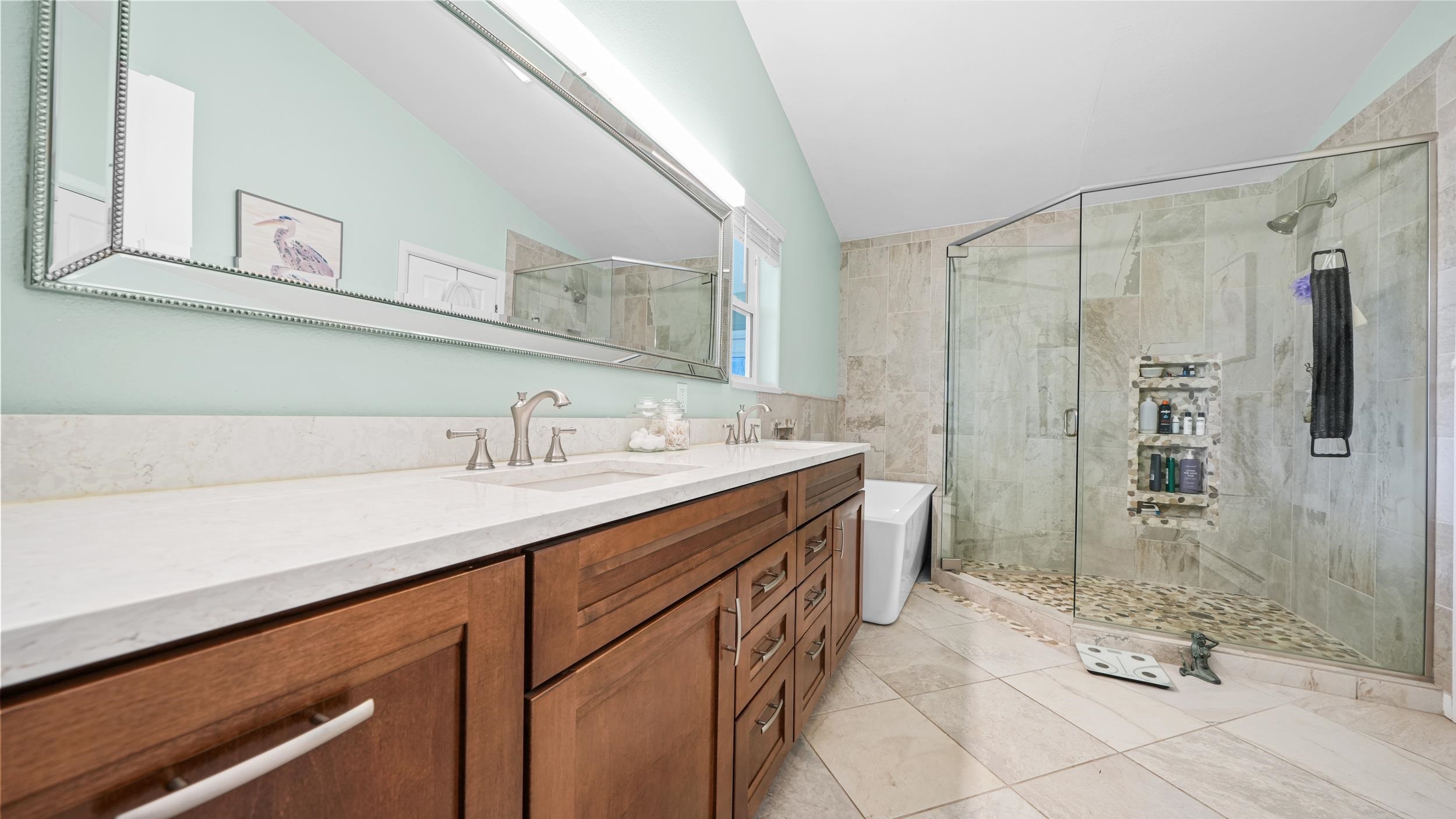 1392 M M 1/4 Road Loma, CO 81524 - Photo 17 of 42 a bathroom with a sink double vanity and shower