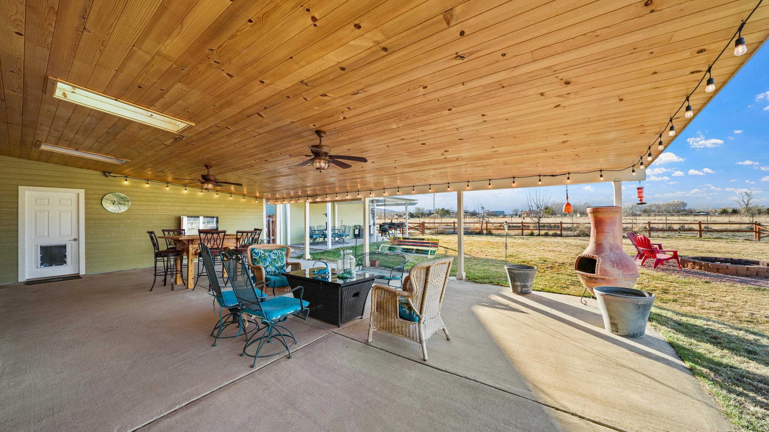 1392 M M 1/4 Road Loma, CO 81524 - Photo 25 of 42 a view of a swimming pool with a table and chairs