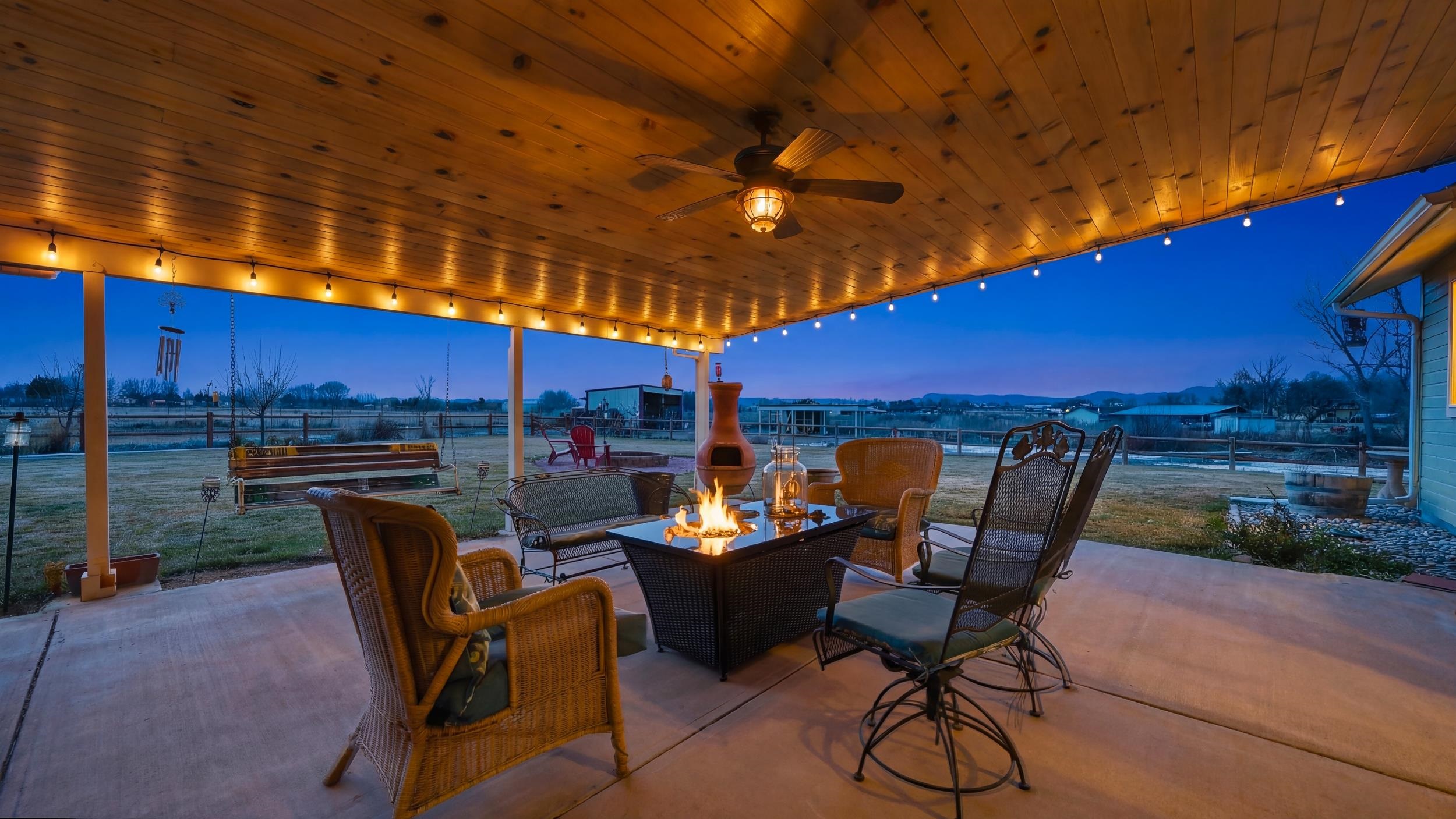 1392 M M 1/4 Road Loma, CO 81524 - Photo 28 of 42 a view of a chairs and tables in patio
