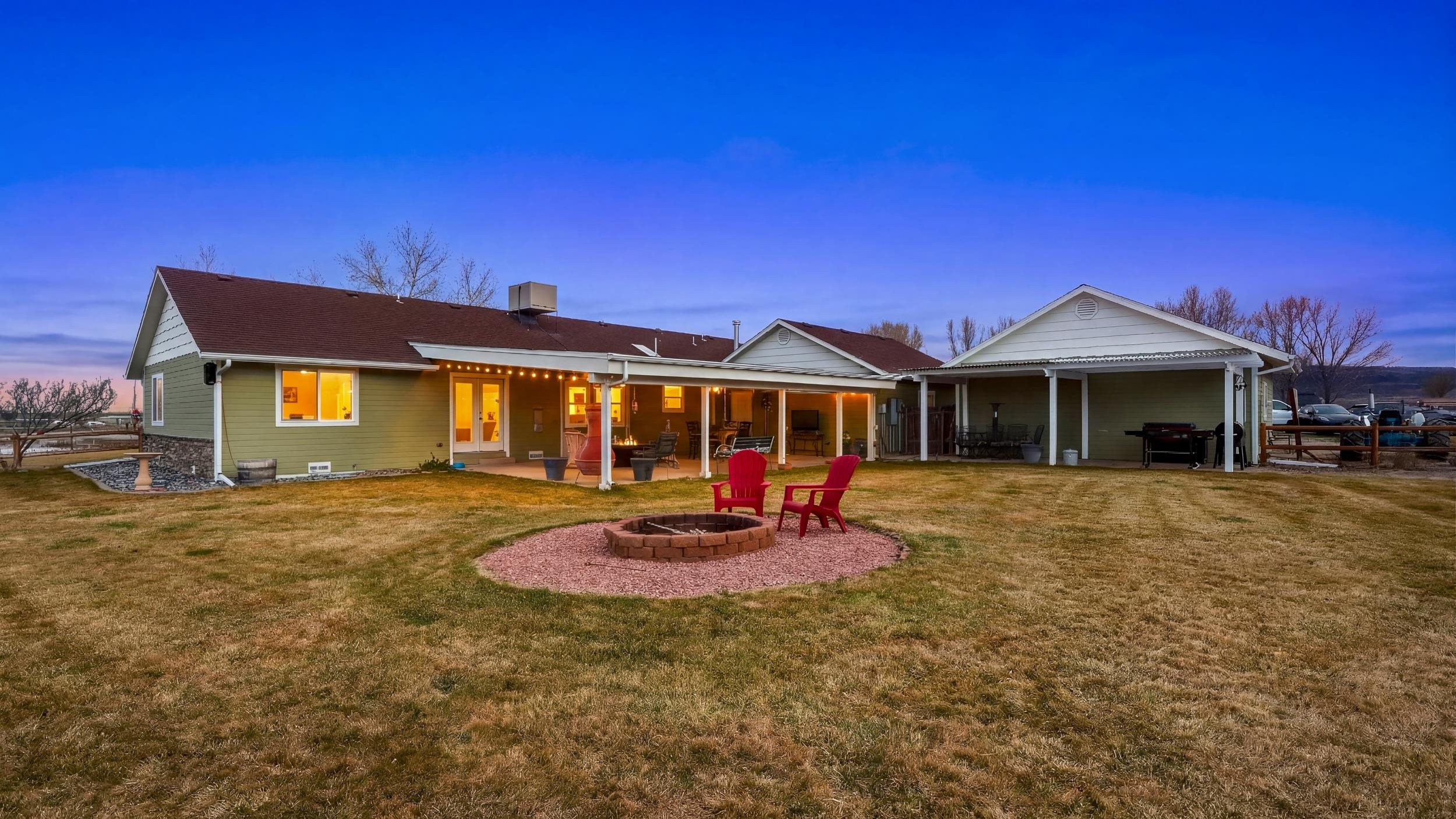 1392 M M 1/4 Road Loma, CO 81524 - Photo 31 of 42 a front view of a house with sitting space