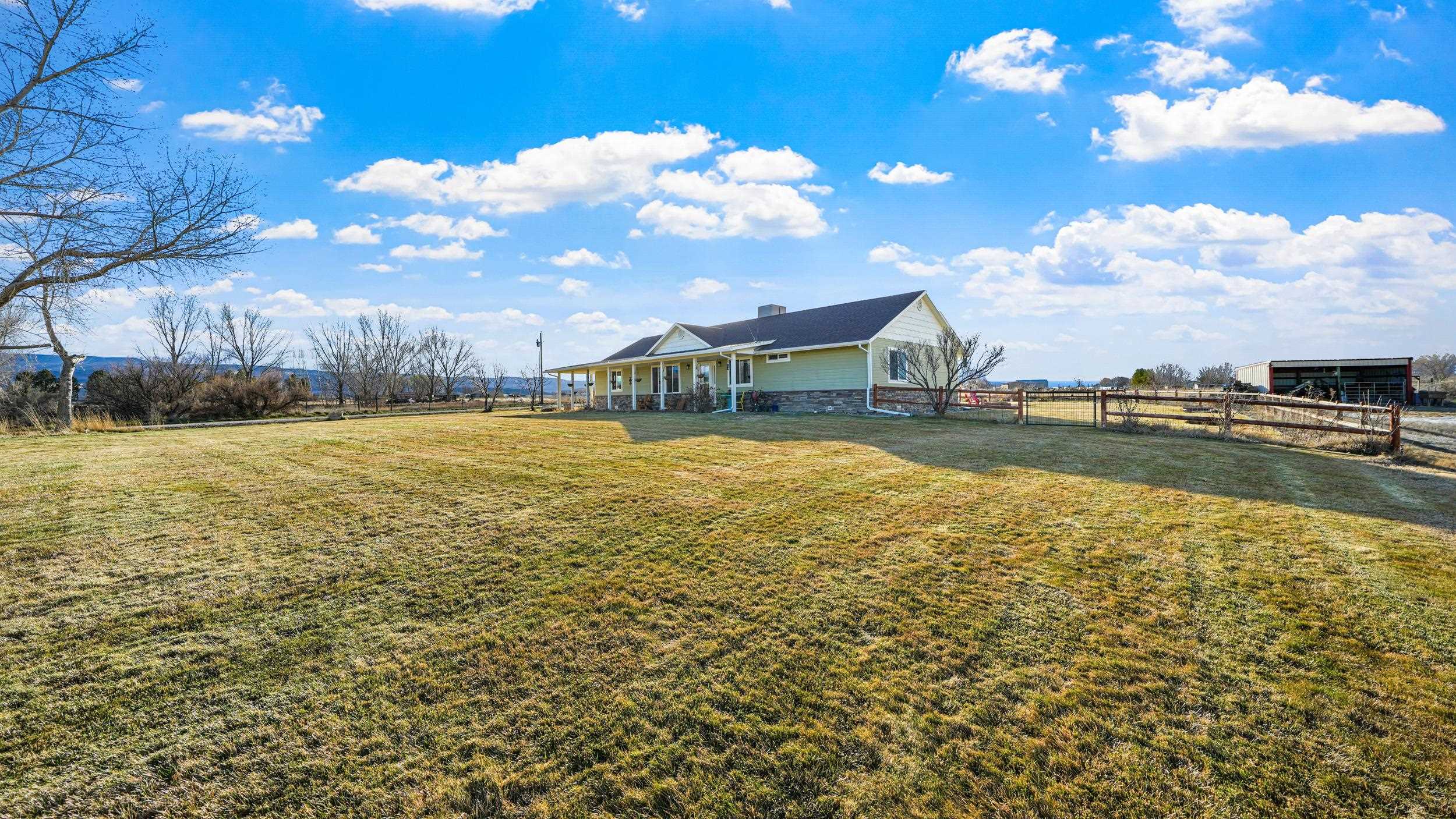 1392 M M 1/4 Road Loma, CO 81524 - Photo 35 of 42 a view of a lake with houses