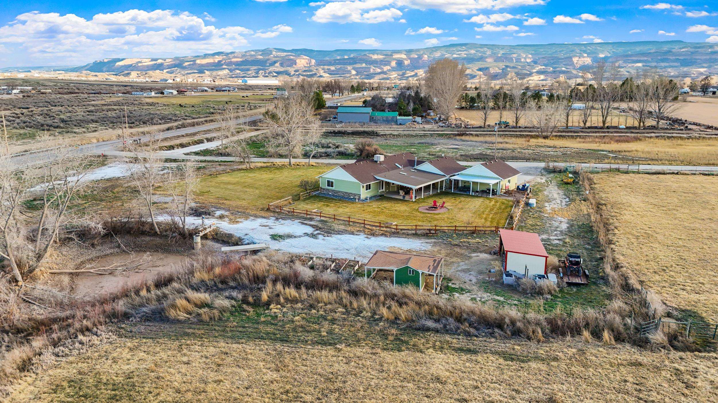 1392 M M 1/4 Road Loma, CO 81524 - Photo 39 of 42 a view of a city with an ocean