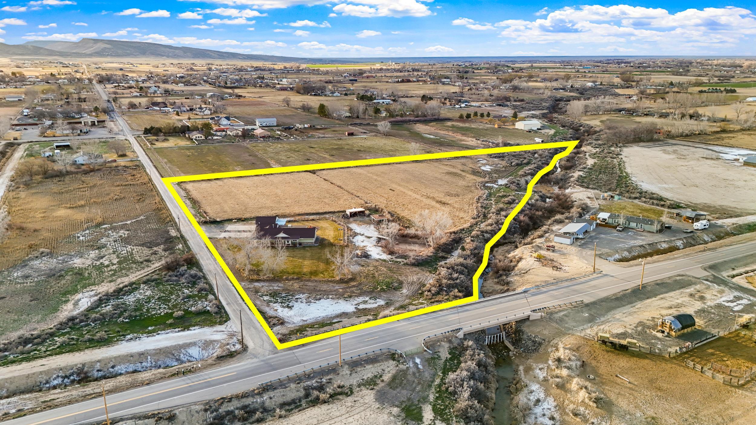 1392 M M 1/4 Road Loma, CO 81524 - Photo 42 of 42 a view of a balcony with an ocean