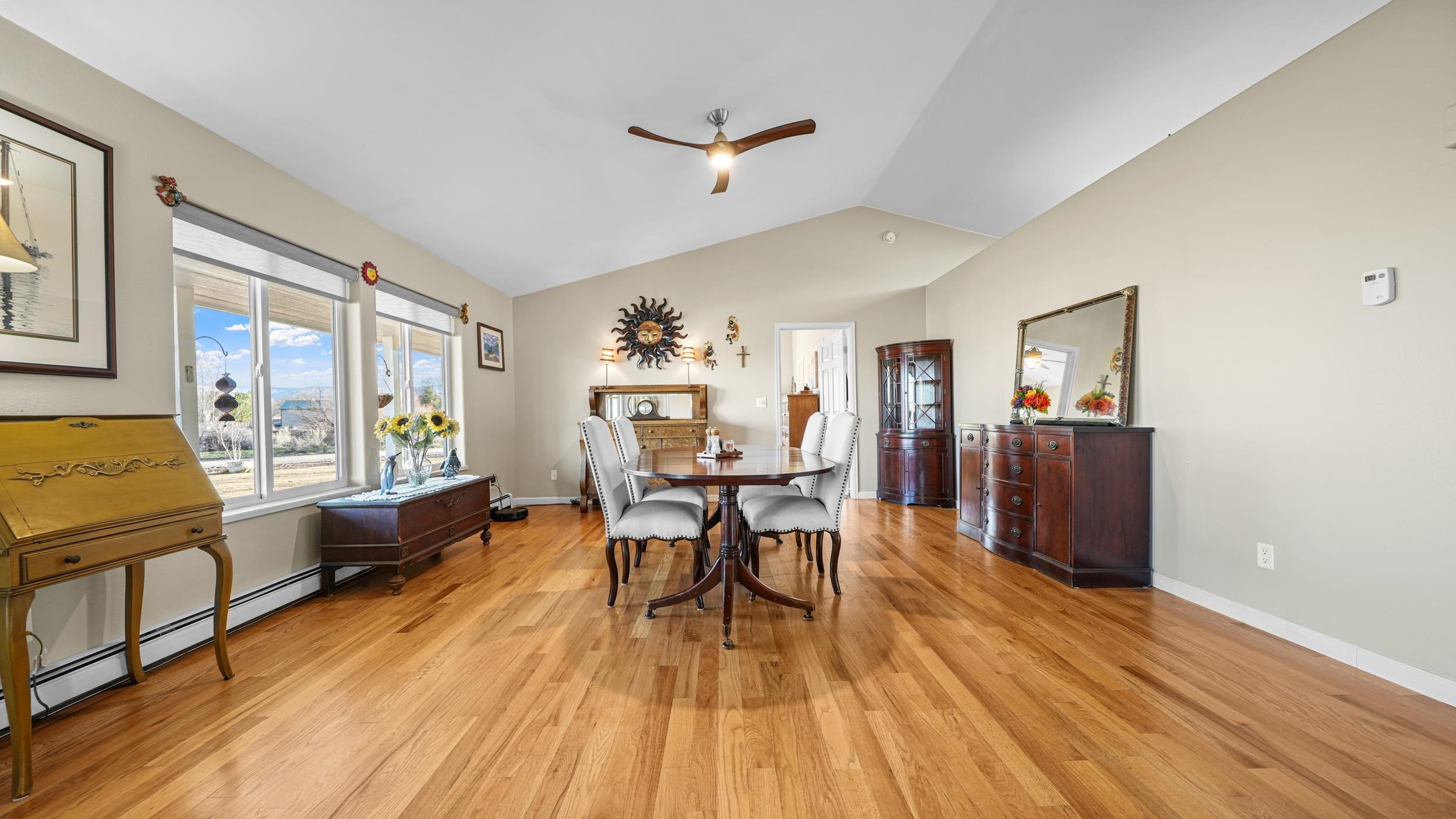 1392 M M 1/4 Road Loma, CO 81524 - Photo 5 of 42 a dining room with wooden floor and stainless steel appliances