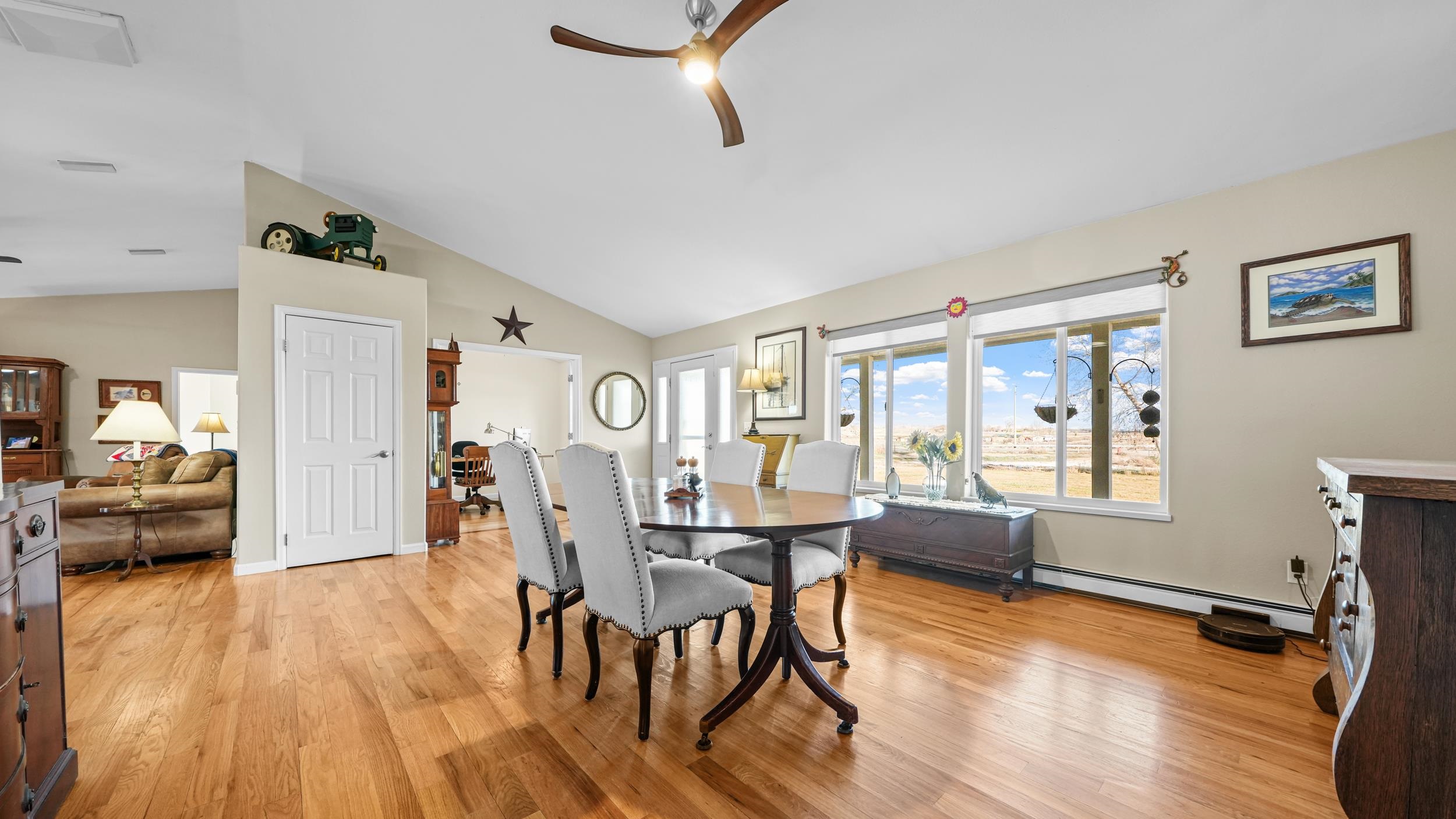 1392 M M 1/4 Road Loma, CO 81524 - Photo 6 of 42 a dining room with furniture and wooden floor