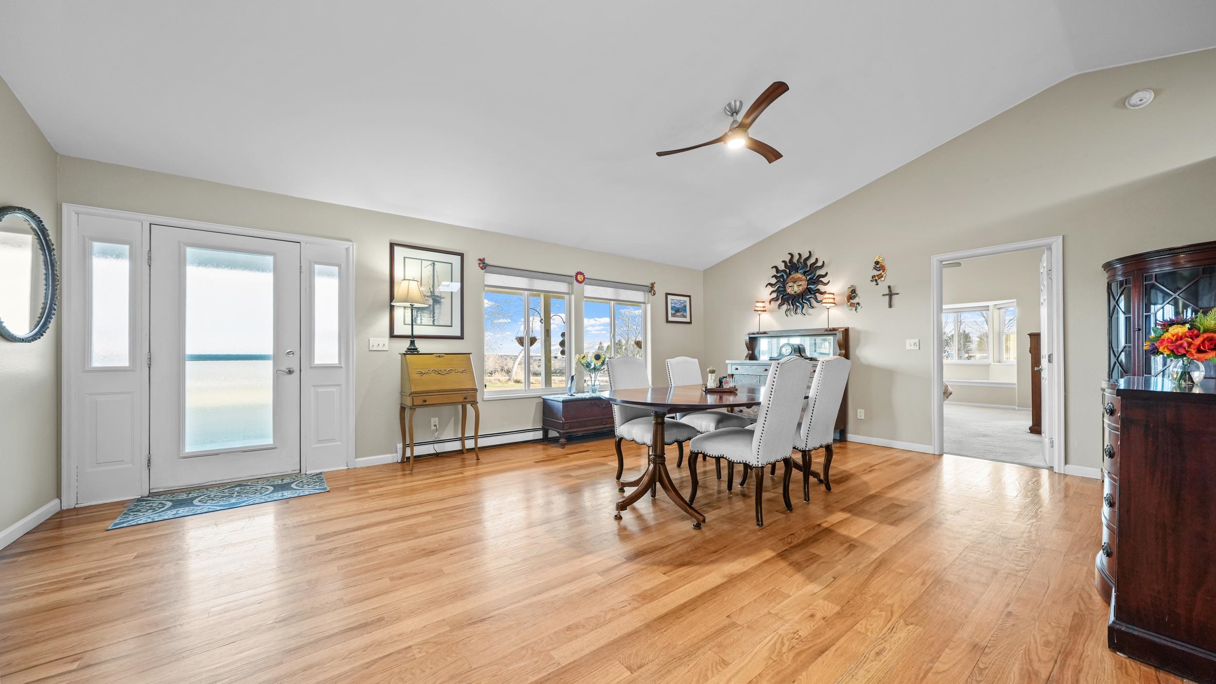 1392 M M 1/4 Road Loma, CO 81524 - Photo 7 of 42 a view of a livingroom with furniture and wooden floor