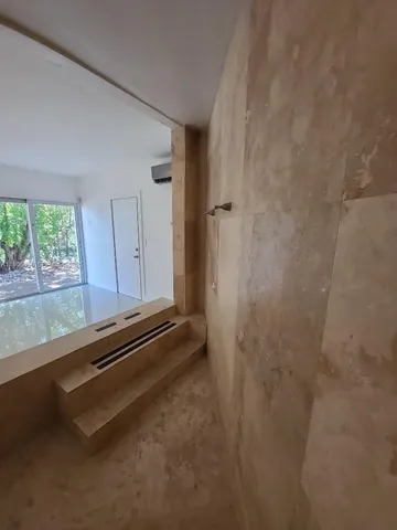 view of an empty room with a window