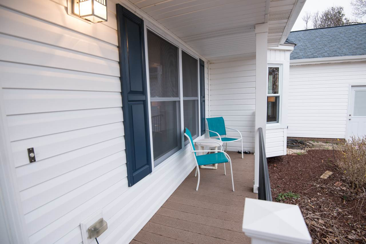612 Canady Court Willow Spring, NC 27592 - Photo 23 of 24 sit on this great front porch and enjoy some lemonade Exterior Front